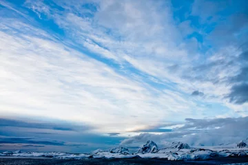 Fotobehang Beautiful snow-capped mountains © Goinyk