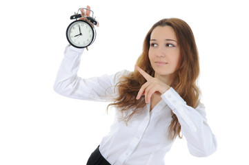 woman with an alarm clock in a hand.