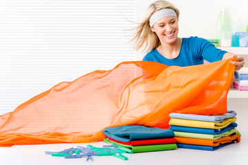 Laundry - woman folding clothes