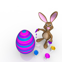 easter bunny paints easter egg