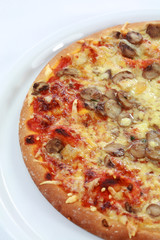 Pepperoni pizza with mushrooms