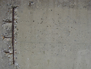 fortified concrete panel with rusty metal showing