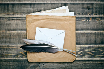Quill pens and Envelope with old paper