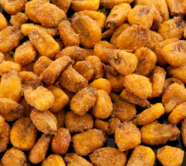 Fried corn snacks closeup background