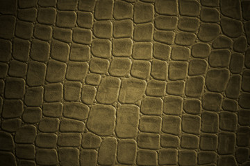 brown crocodile leather imitation texture .