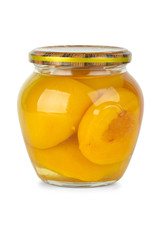 Glass jar with conserved peach fruits