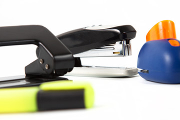 office hole punch and staplers isolated in white