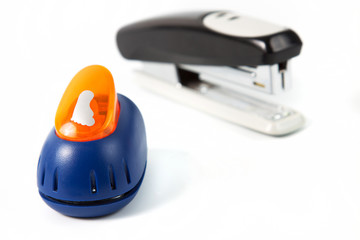 office hole punch and staplers isolated in white