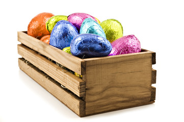Colorful easter eggs in a wooden box