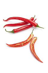 Whole and half red hot chili pepper