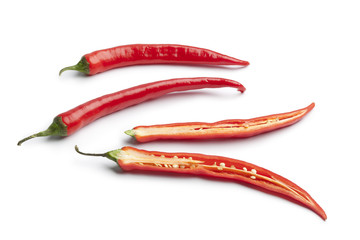 Whole and half red hot chili pepper