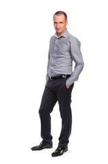 Successful business man in shirt, full length portrait isolated