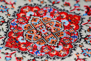Fototapeta premium Large view of bright pattern on carpet