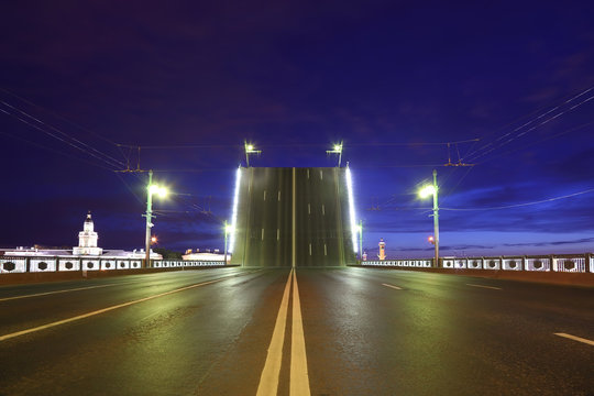 Night view of raised bridge in St.Petersburg, Russia.