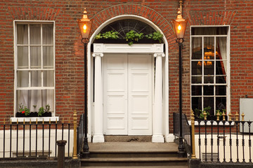 first floor and entrance to beautiful building, white door