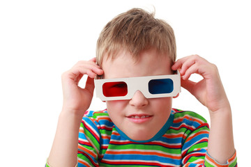 little concentrated boy in striped shirt and anaglyph glasses