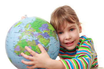 beautiful little girl in shirt play with inflatable globe