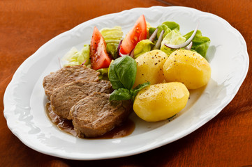 Roasted meat and vegetables