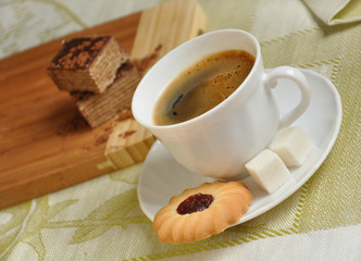 Morning coffee with biscuits and cake