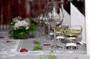 Goblets and aperitif glasses on wedding table