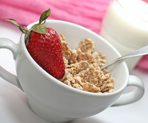 Bowl and spoon with corn