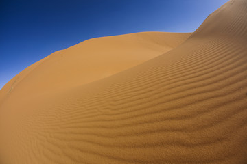 Fototapeta na wymiar Desert Sand z wydmy w Maroku, Merzouga