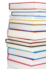 pile of new books isolated on white