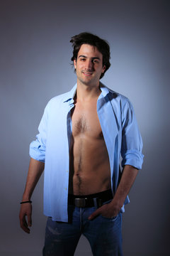 young man with unbuttoned shirt