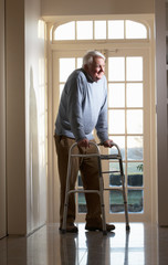 Elderly Senior Man Using Walking Frame