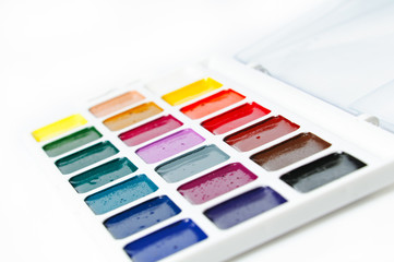 watercolour paints on a white background