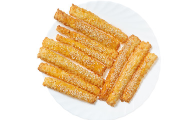 Sweet baking sticks on a white plate