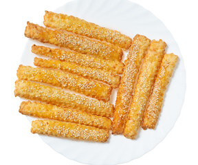 Sweet baking sticks on a white plate