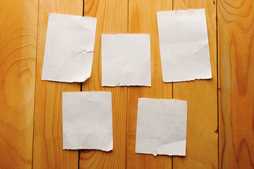 Scraps isolated on wooden background