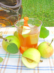 fruit summer pouring tea with apple