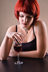 girl c a red wine glass