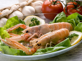 norway lobster with salad on dish