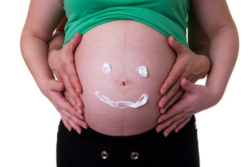 Smiley on the stomachs of pregnant women