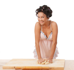 housewife mix dough on the wooden board.