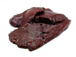 Slices of fresh liver on a white background