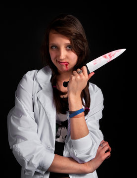 Angry Nurse With Bloody Knife Over Black