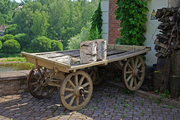 Cart in a country house court yard