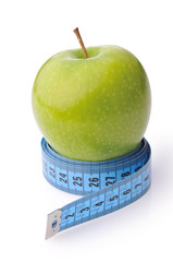 Apple with rule on a white background