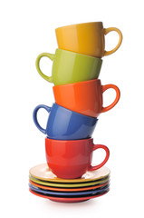 Five cups with saucers on a white background