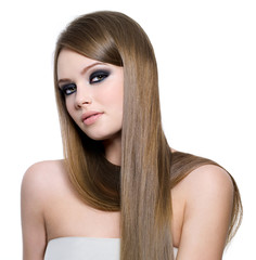 Portrait of beautiful teen girl with long straight hair