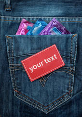 Condom's in pocket with blank red note paper on pocket