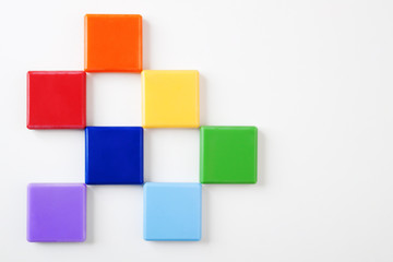 Colorful rainbow squares on bright background #2