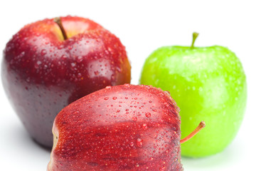 apple with water drops isolated on white