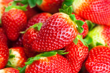background of red big juicy ripe strawberries