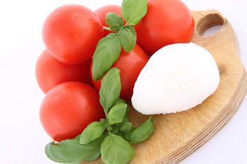 Caprese salad ingredients- tomatoes, mozzarella and basil