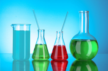 Laboratory glassware on black background